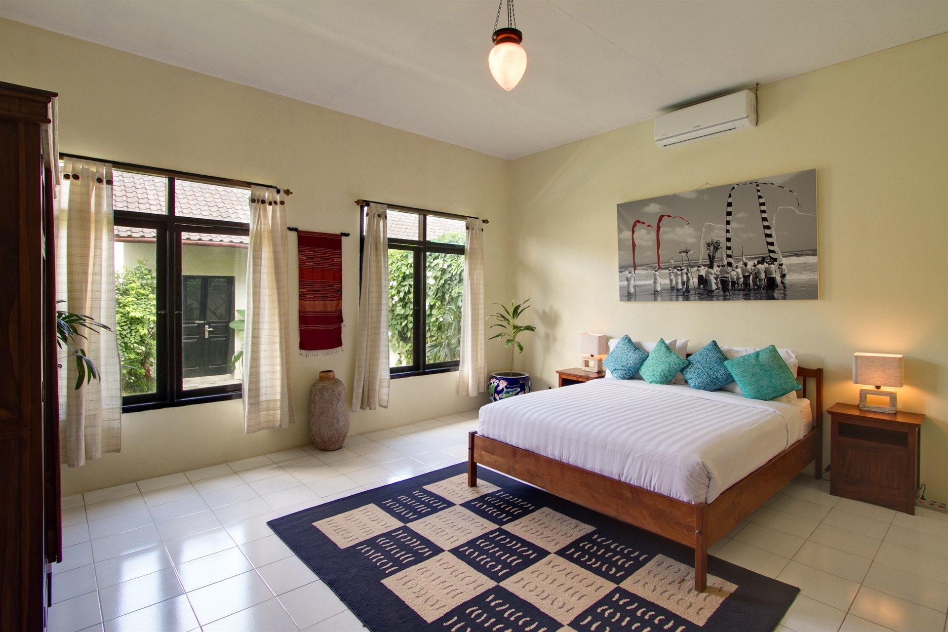 There is a large bed in the middle of the room.