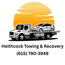 White tow truck with a car on its flatbed; orange sun background. "Heithcock Towing & Recovery" (615) 790-3949.
