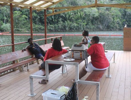 Professors and Students on a Pontoon Boat in the Vaca Reserve in Belize