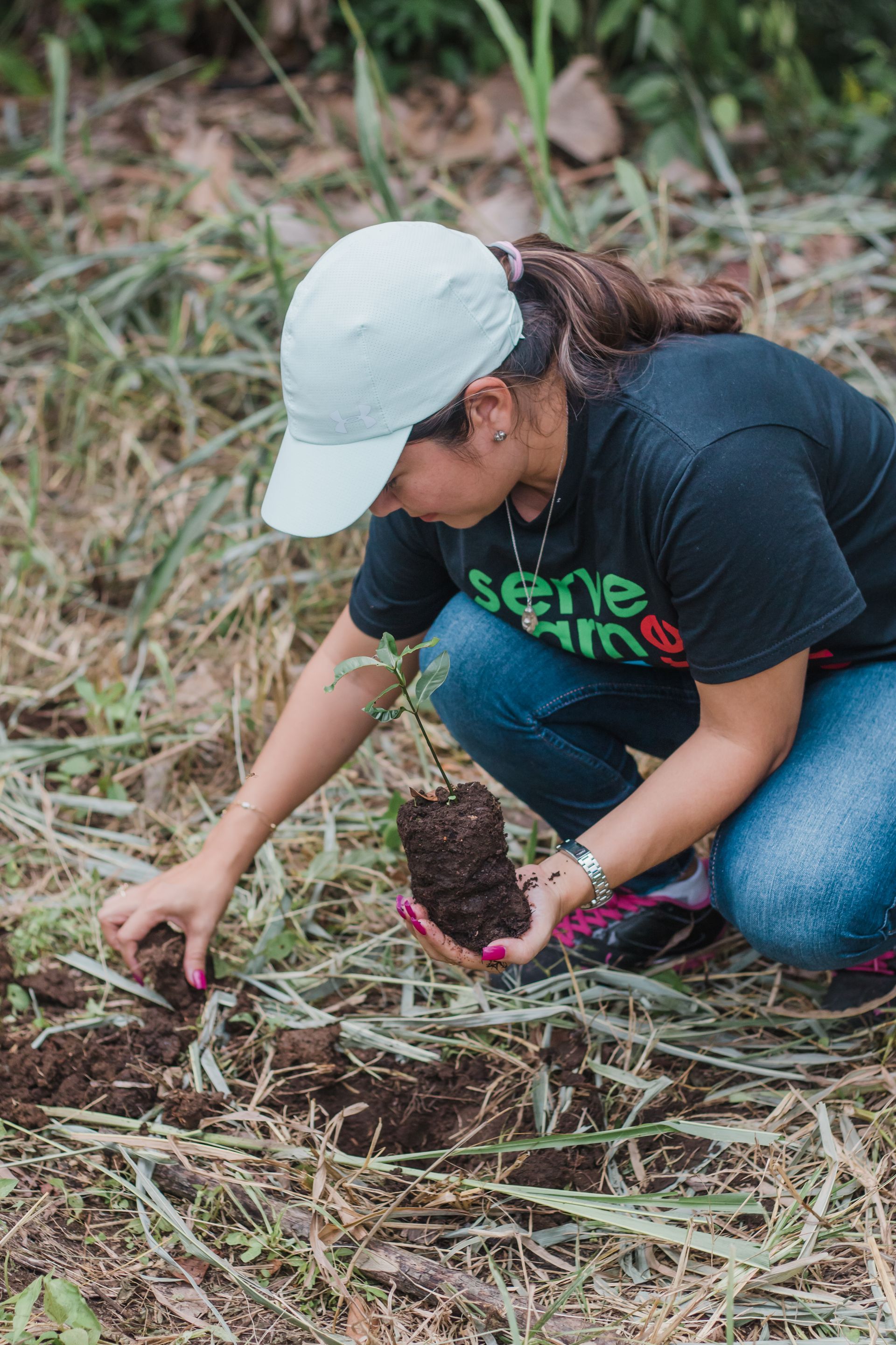 Toucan Operations Manager Planting Seedlings.