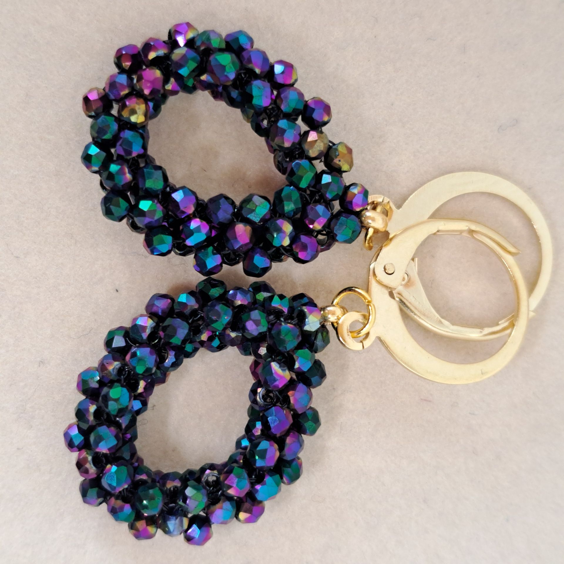 D2 2113Oorbellen donkergroen/donkerpaars glans