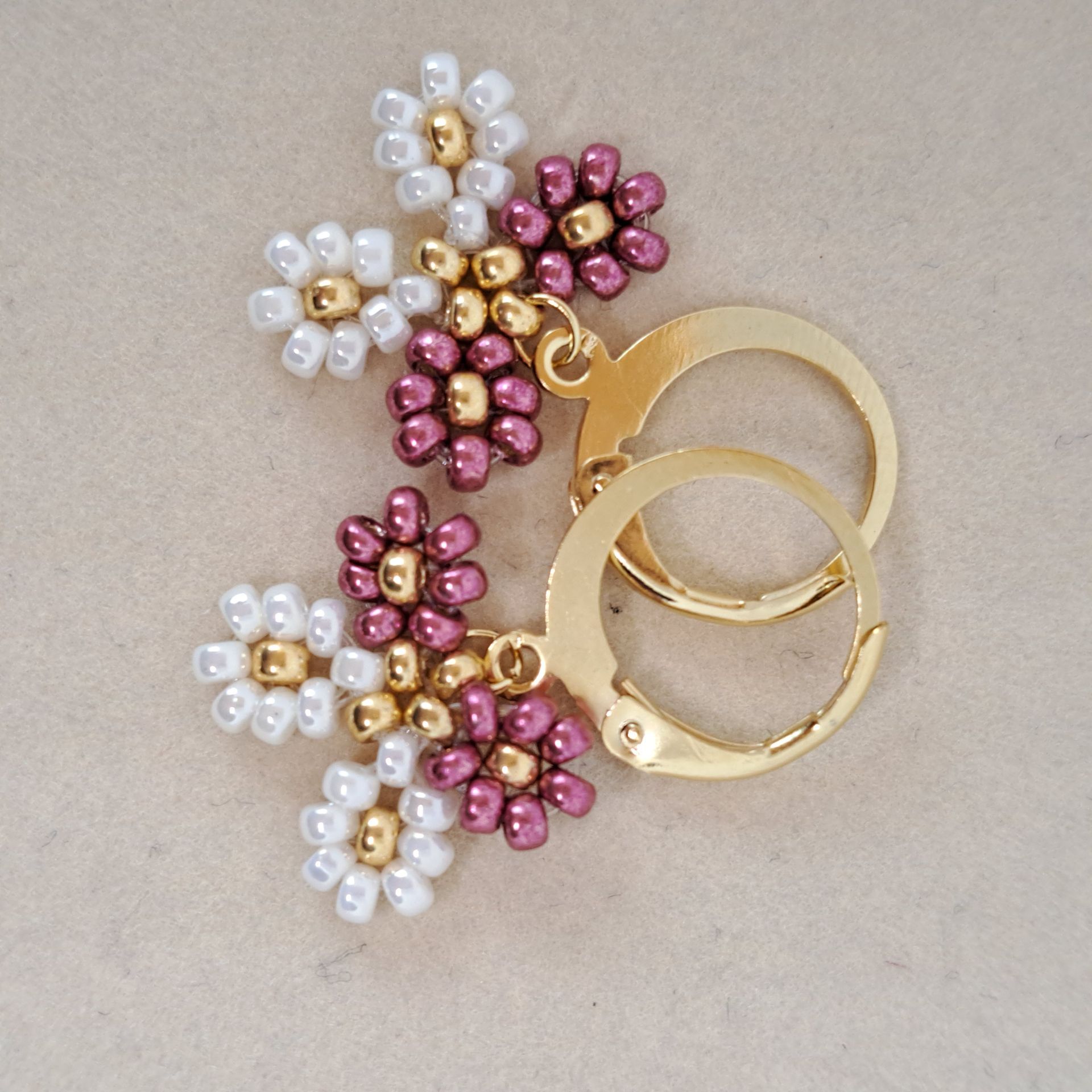 210, Oorbellen rose met wit - Vlindertje