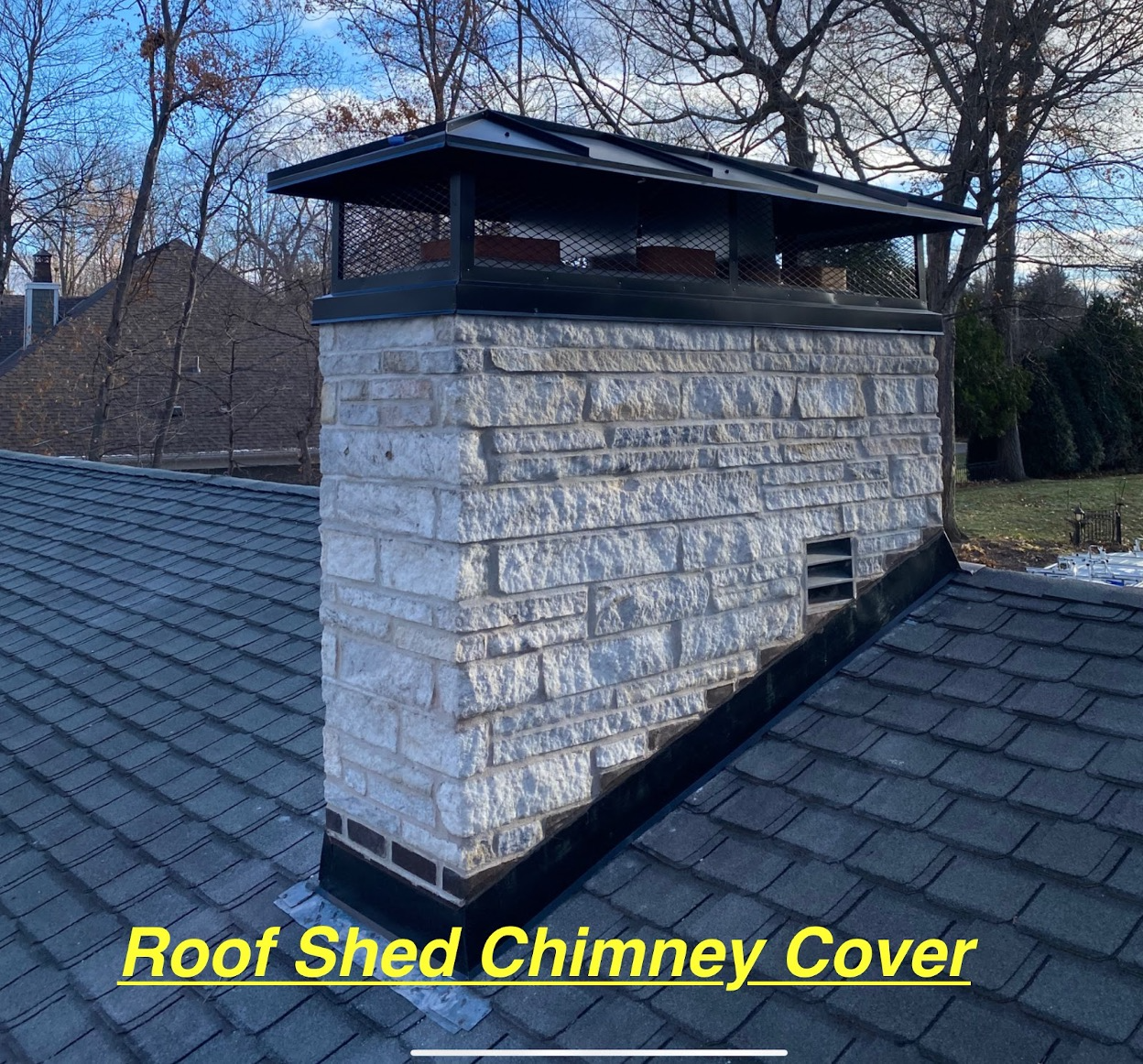 A chimney with a roof shed chimney cover on it