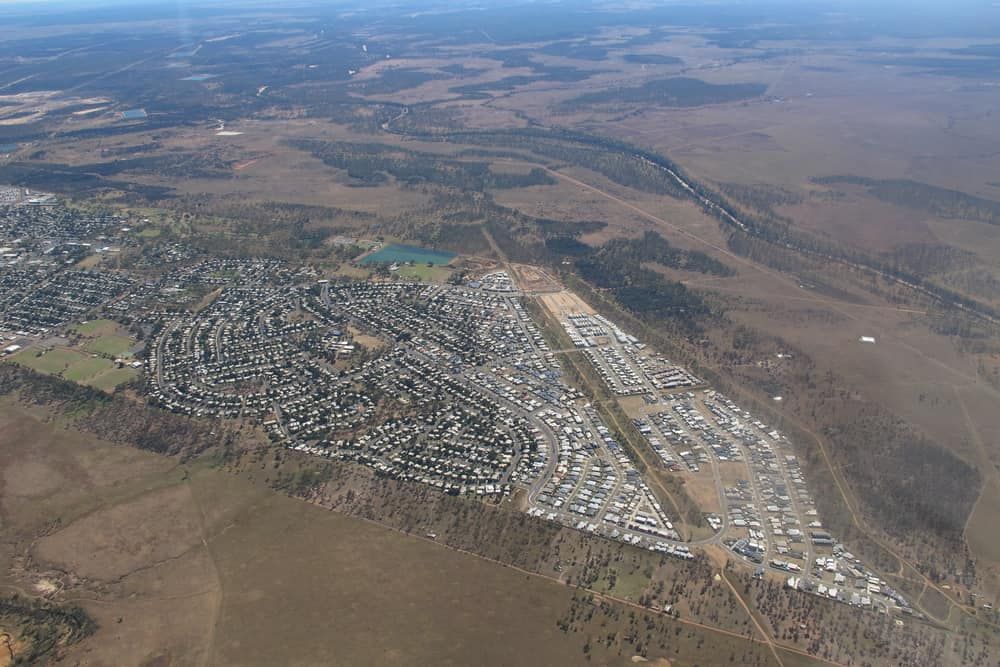 An Aerial View of a Small Town in the Middle of a Desert — Reed Plumbing Industries in Moranbah, QLD