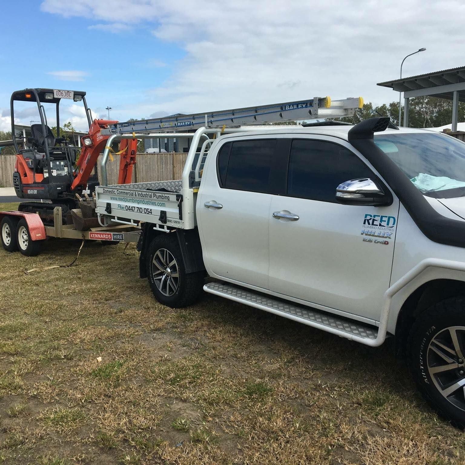 The Side View Of The Reed Plumbing Industries Ute— Reed Plumbing Industries in Mackay, QLD
