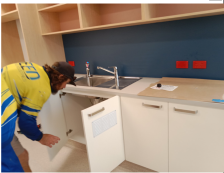 Plumber Inspecting a Kitchen — Reed Plumbing Industries in Mackay, QLD