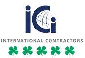 The logo for international contractors has a globe and clovers on it.
