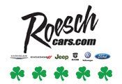 A logo for a car dealership with clovers on it.