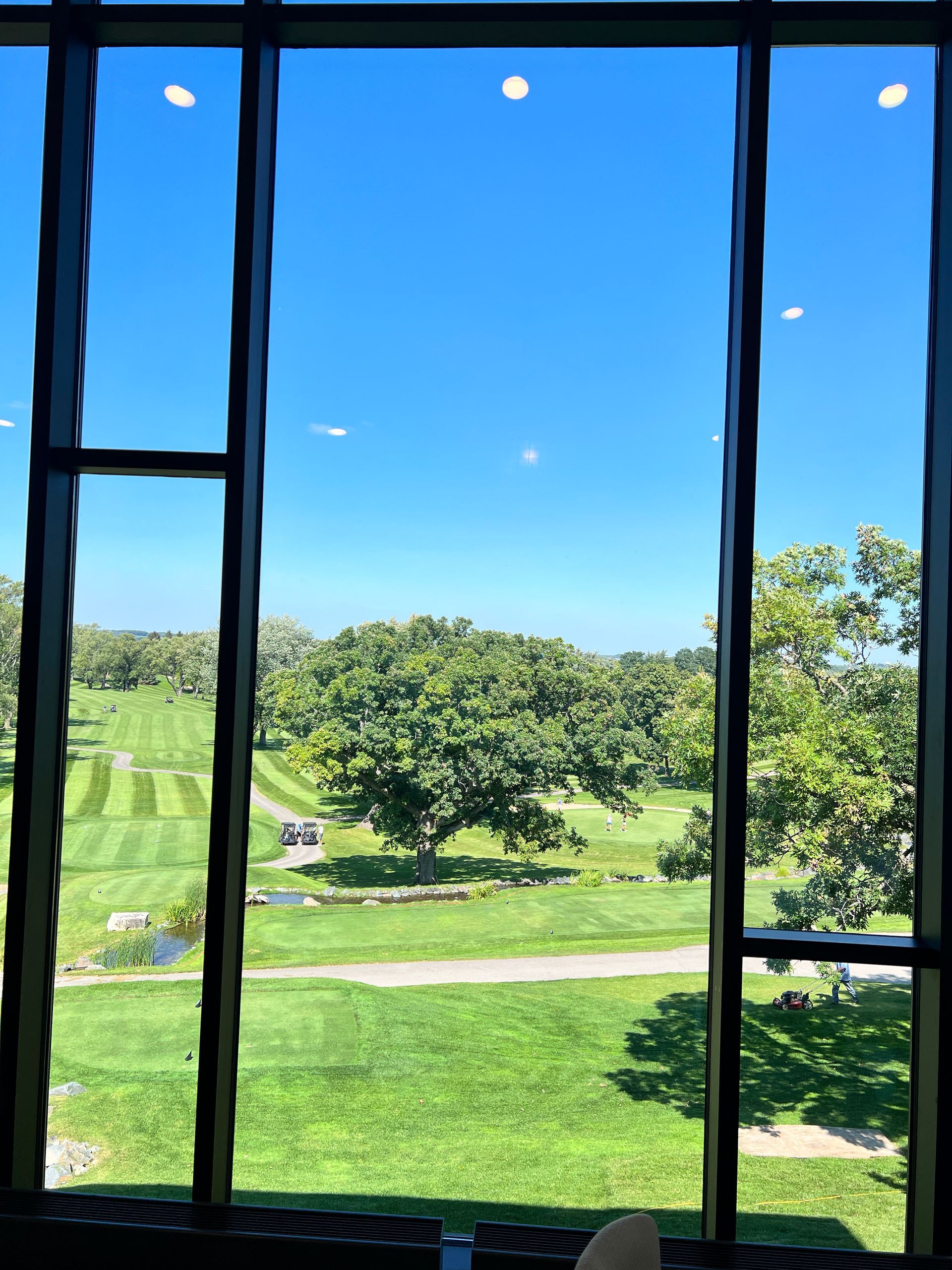 A tall building with lots of windows and balconies