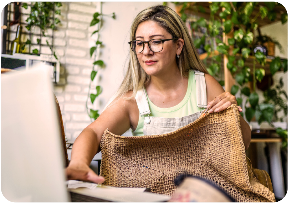 Woman making bag and online
