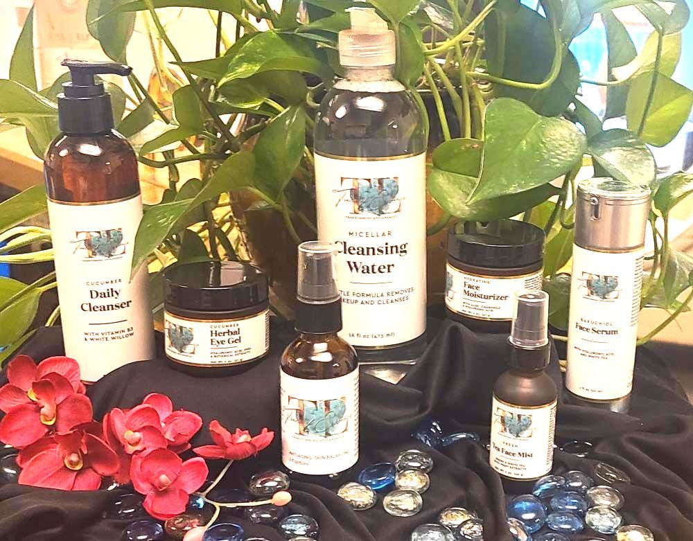 A close up of a woman 's face with makeup on.