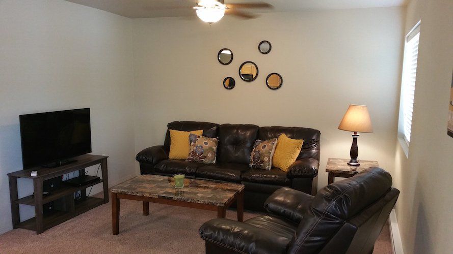 Staged living room in a Prairie Meadows Townhome