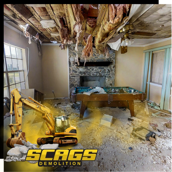 A demolished  interior with scags excavator