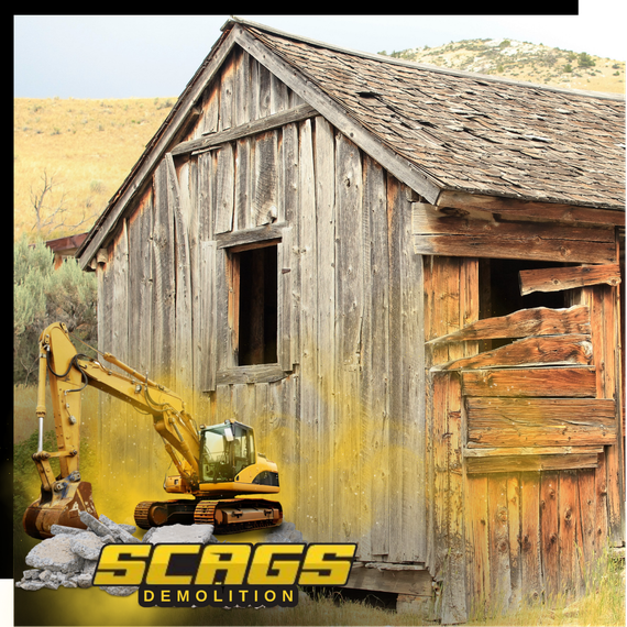 An old shed with scags excavator