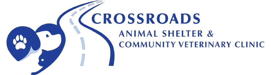 Logo for Crossroads Animal Shelter & Community Veterinary Clinic with a dog paw, a dog, and a road.