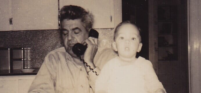 Man Talking In Phone And Baby — Cape Elizabeth, ME — L.P. Murray & Sons, Inc.