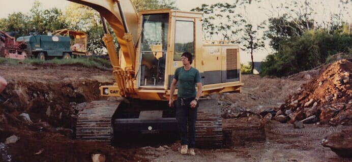 Man In Front Of Excavator — Cape Elizabeth, ME — L.P. Murray & Sons, Inc.