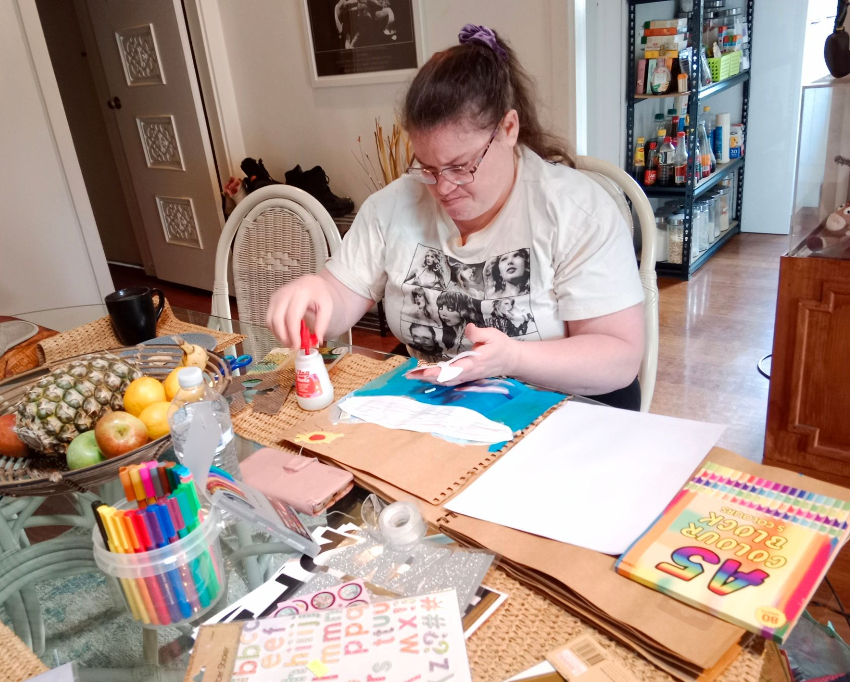 A Woman Is Helping a Young Girl in A Wheelchair at A Playground — VAL Disability Services in Taree, NSW