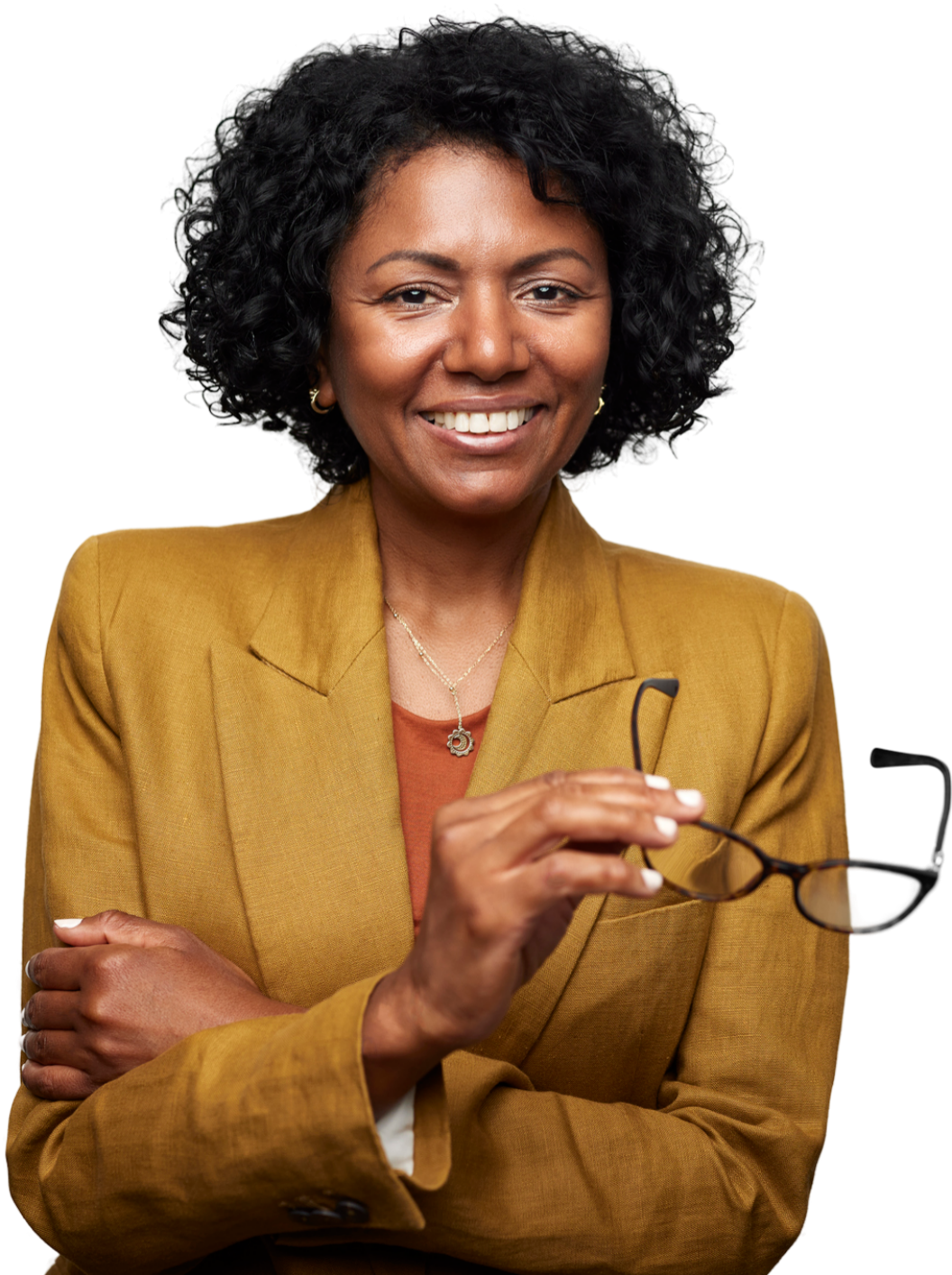 A woman in a yellow jacket is holding a pair of glasses
