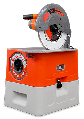 A circular saw is sitting on top of an orange and white box.