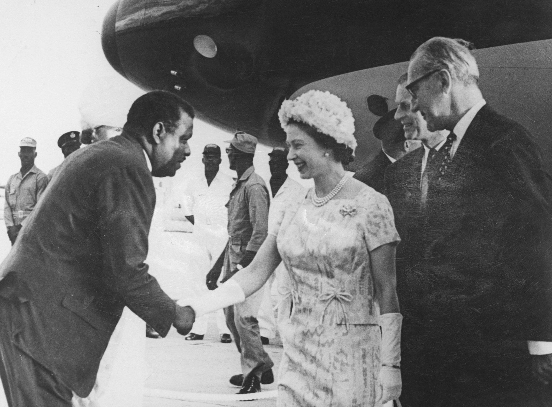 The Queen is welcomed by Prime Minister of Barbados, the Honourable Errol W. Barrow