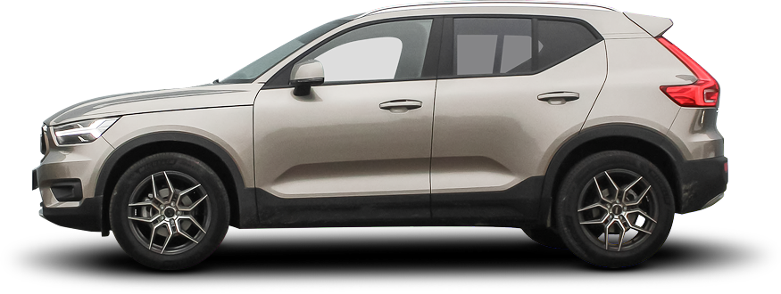 Side view of a light gray Volvo XC40 SUV with black wheel arches and dark gray wheels. | Madison Automotive