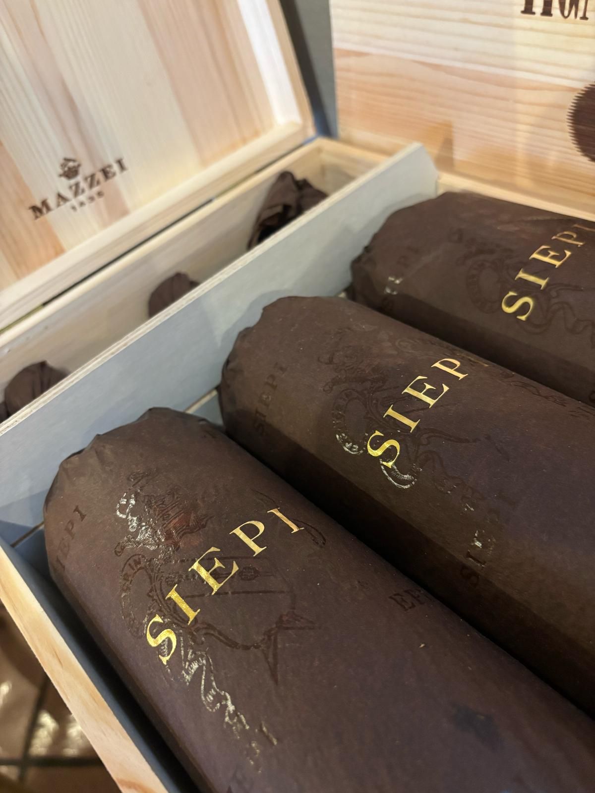 Tre tubi di siepi sono in una scatola