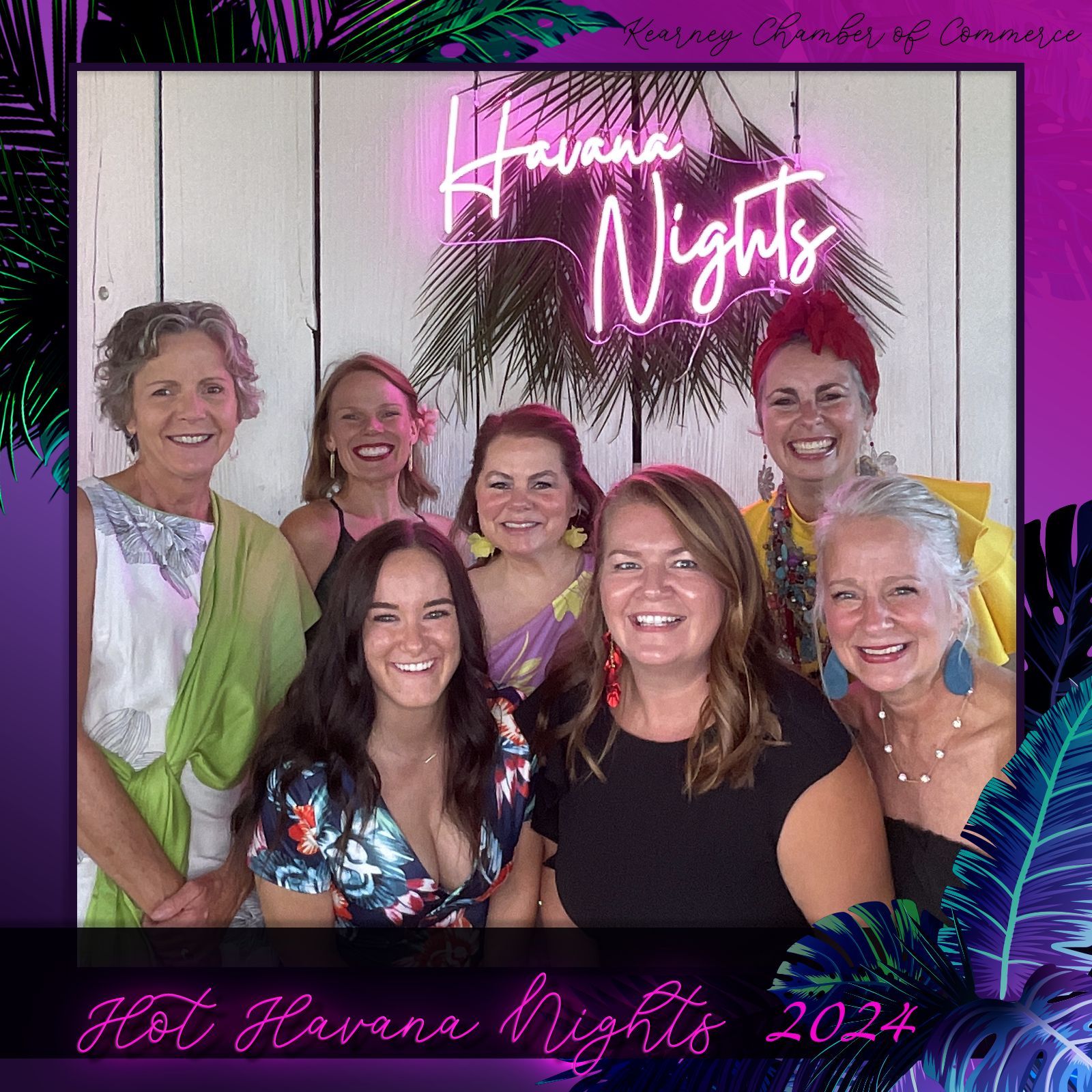 Group of women smiling at a 