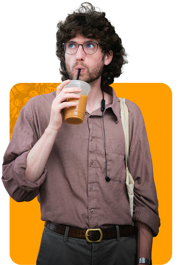 Man with curly hair drinking from a coffee cup; orange background with bag.