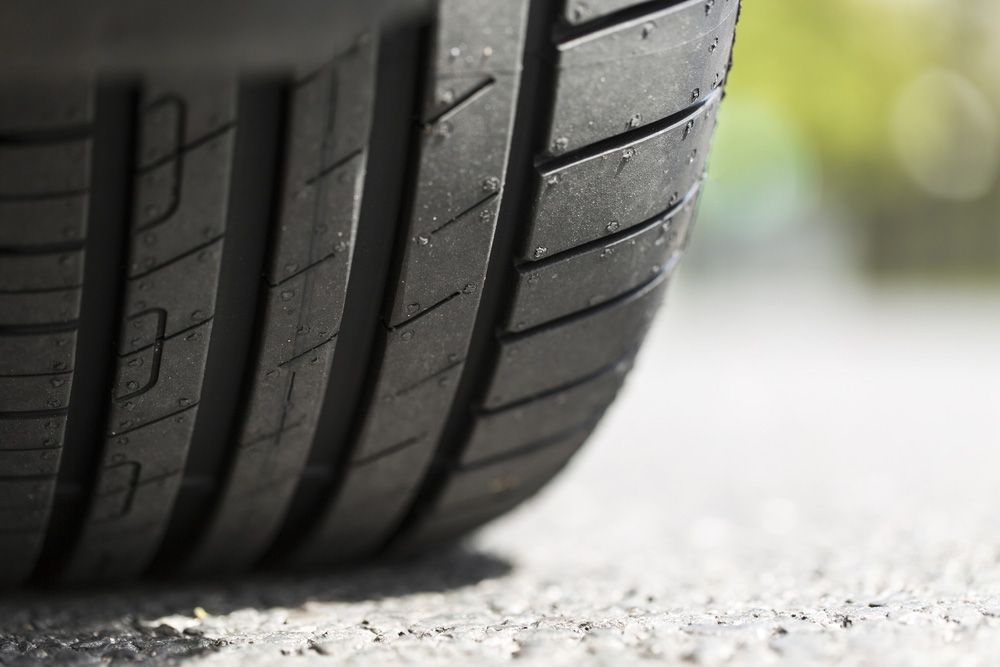 A Close Up of a Car Tire on the Ground — Capricorn Tyre & Mechanical in Yeppoon, QLD