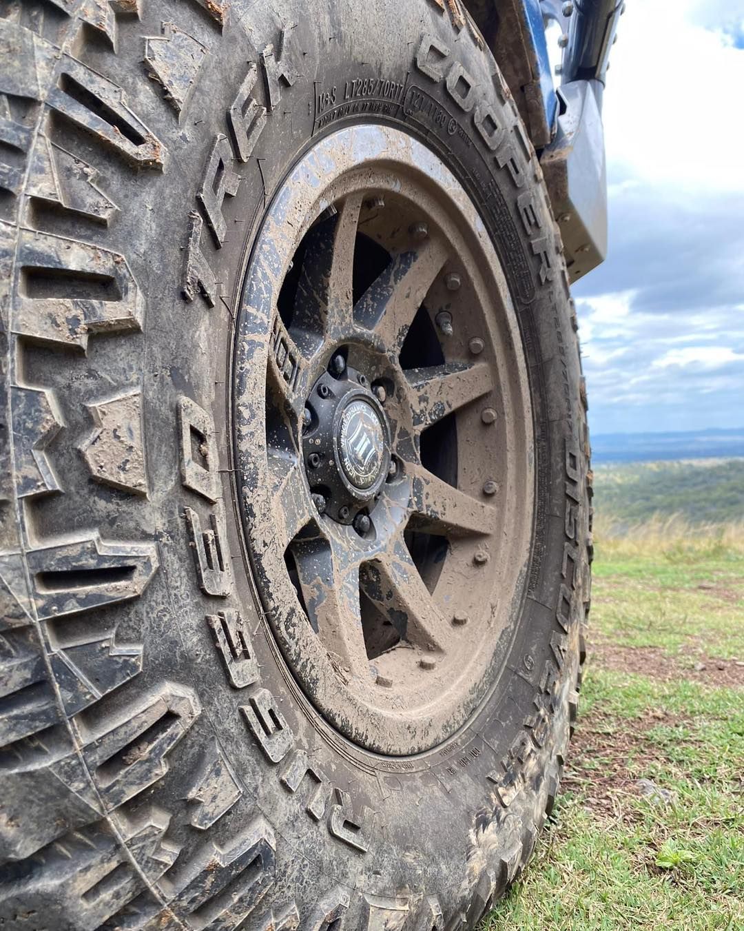 A close up of a muddy tyre on a truck — Capricorn Tyre & Mechanical in Yeppoon, QLD