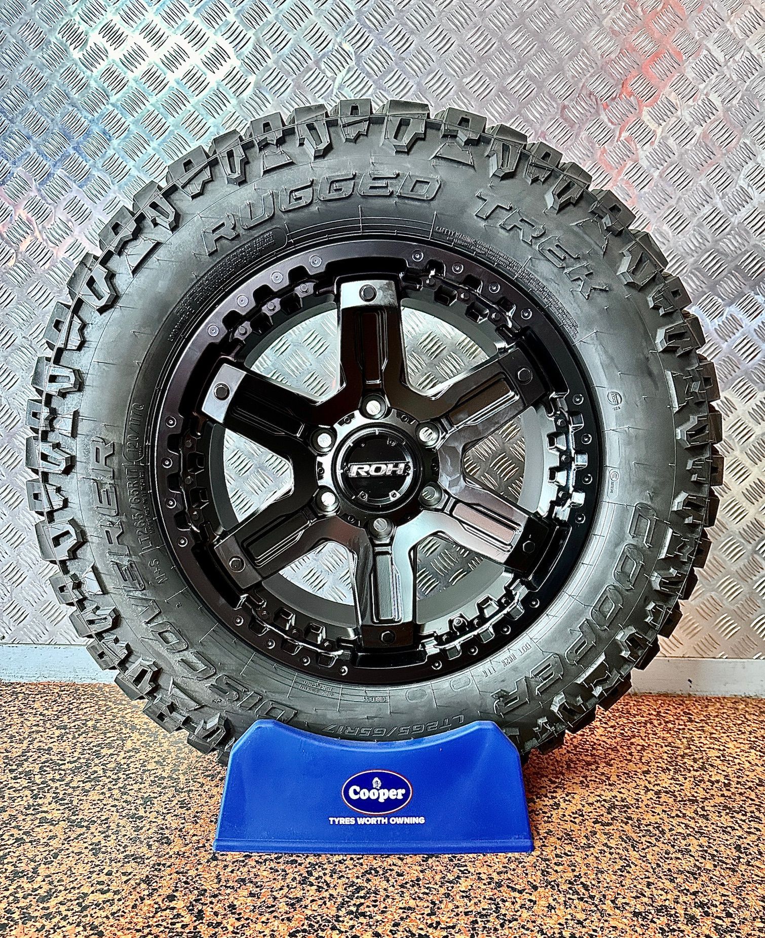 A Close Up of a Tire on a Blue ATV β Capricorn Tyre & Mechanical in Yeppoon, QLD