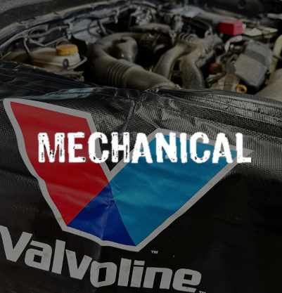 A Mechanic is Working on the Front of a Truck in a Garage β Capricorn Tyre & Mechanical in Yeppoon, QLD