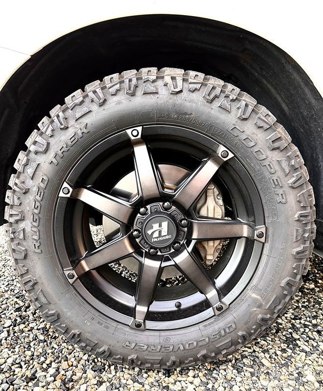 Focused Image of COOPER RUGGED TREK in White Car — Capricorn Tyre & Mechanical in Yeppoon, QLD