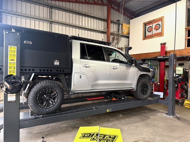 Close Up of a Tire With a Yellow Rim in the Background — Capricorn Tyre & Mechanical in Yeppoon, QLD
