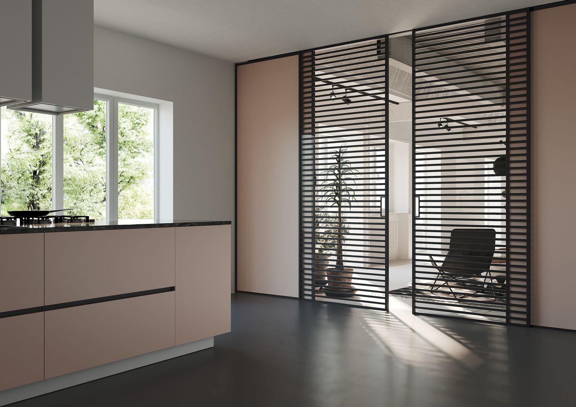 Una cucina con porta scorrevole in vetro tra la cucina e il soggiorno.