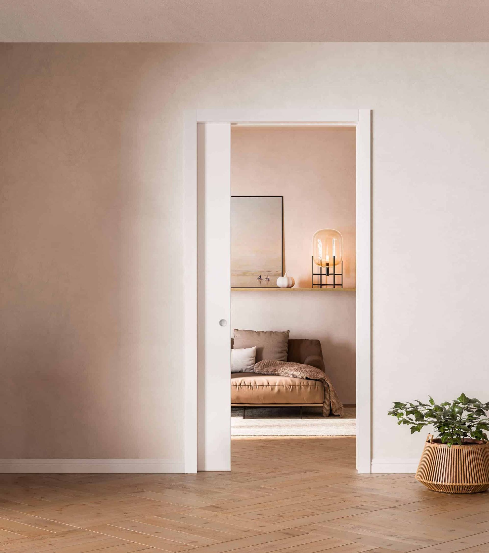 Una stanza con una porta scorrevole che conduce ad una camera da letto.