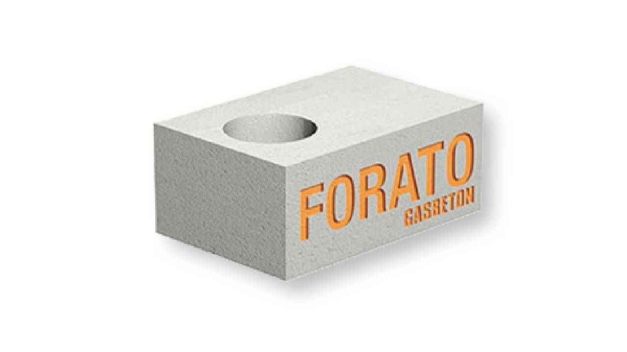 Un blocco bianco con sopra la parola forato