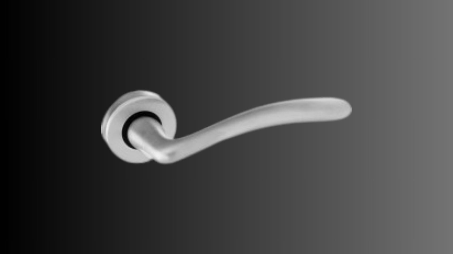 Un primo piano della maniglia di una porta su sfondo nero