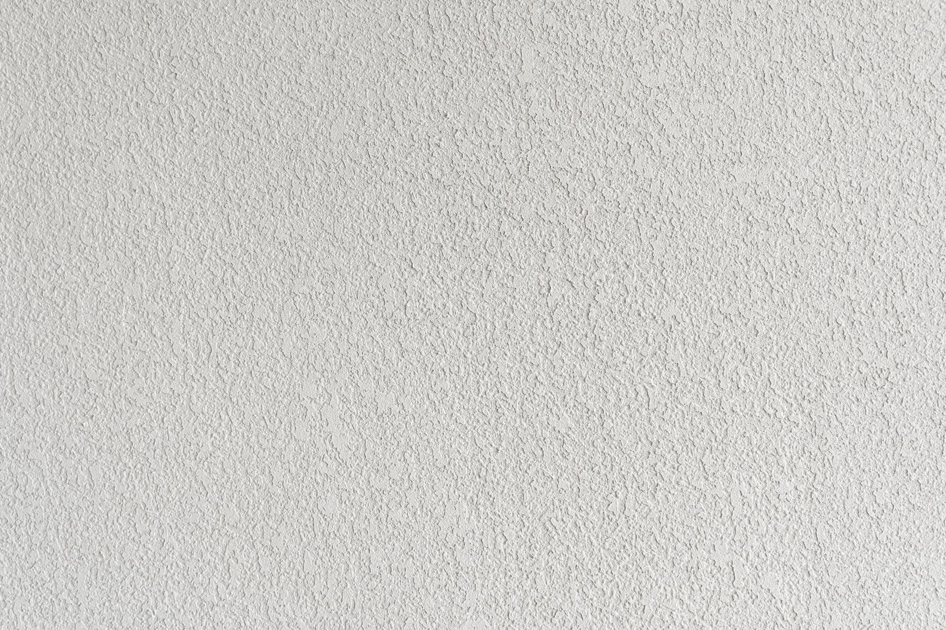 Un primo piano di una trama di tappeto bianco.