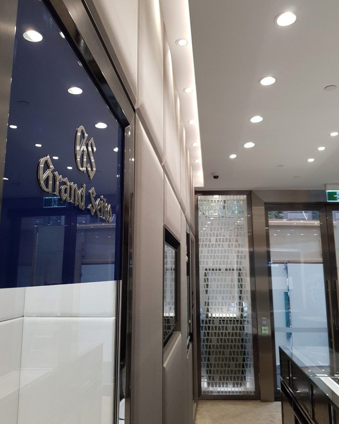 Showing the Stainless Door and Shiny Signage — Stainless Steel Fabrication in Molendinar, QLD