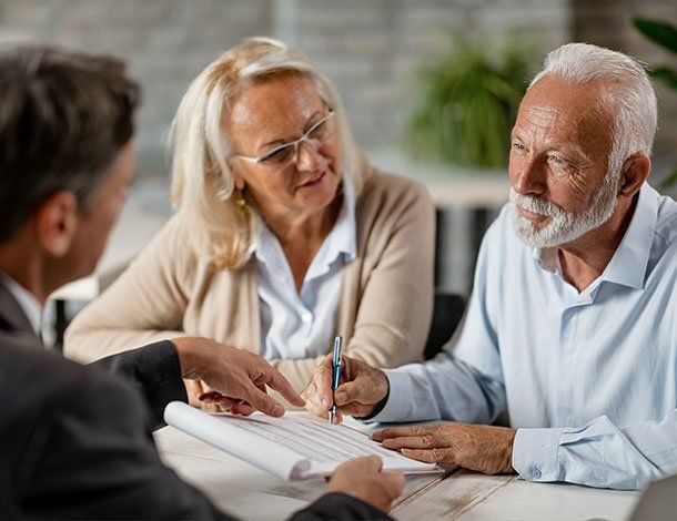 Elderly Couple Talking To Their Attorney — Springfield, MO — Dunn Law Firm LLC