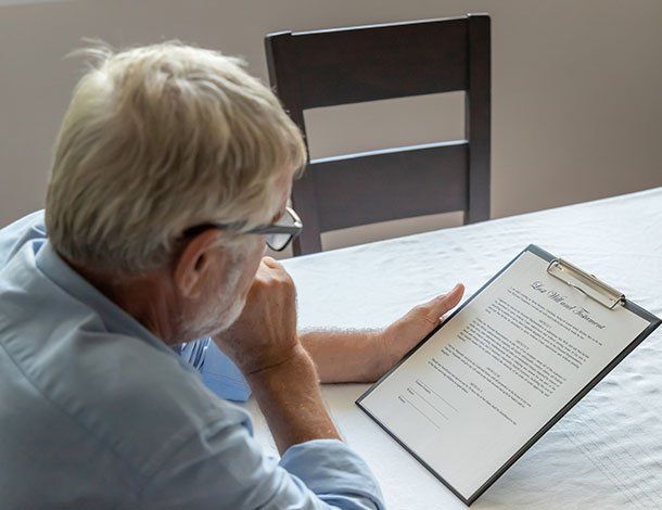 Elder Man Reading Form — Springfield, MO — Dunn Law Firm LLC