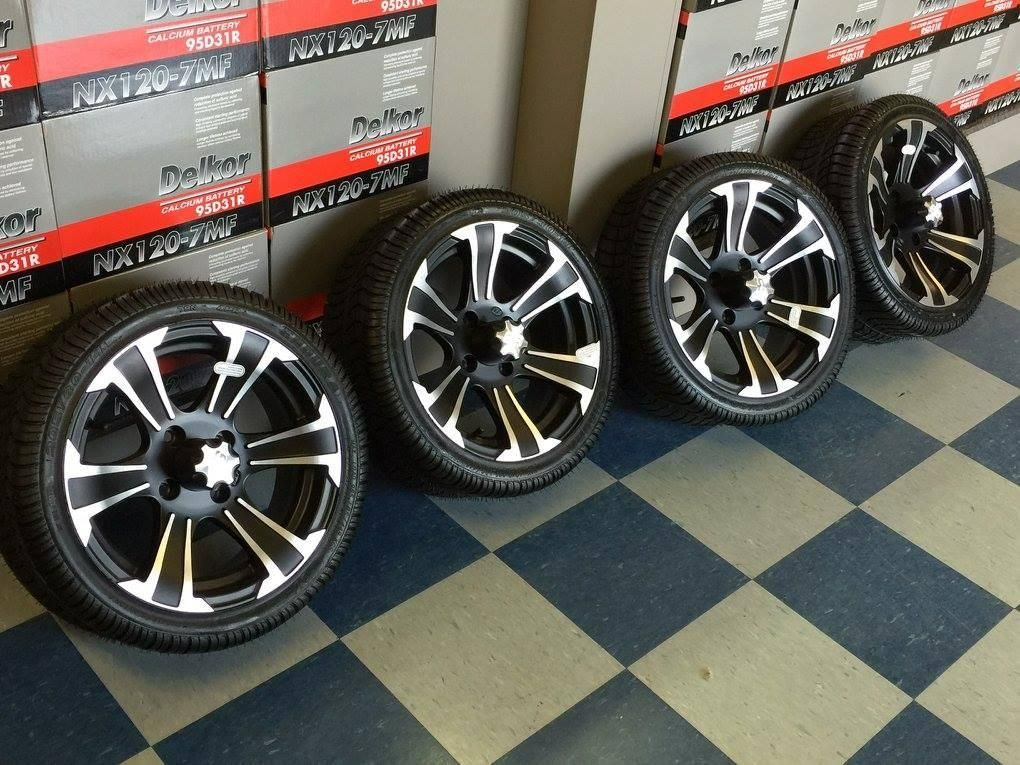 Four Wheels and Tires Are Lined up On a Checkered Floor — DTM Tamworth in Tamworth, NSW
