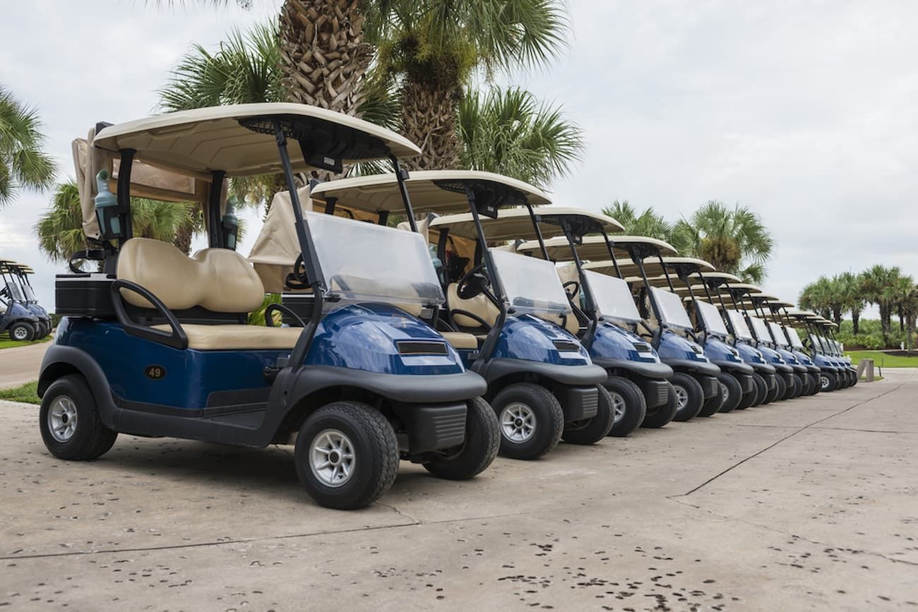 A Row of Golf Carts Are Parked in A Parking Lot — DTM Tamworth in Tamworth, NSW