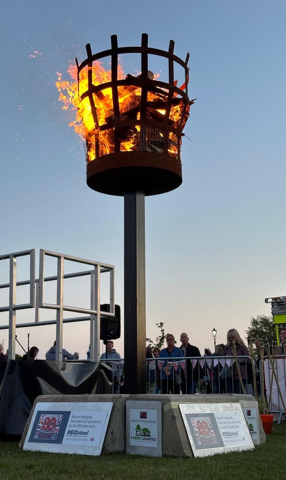 A large torch with flames coming out of it