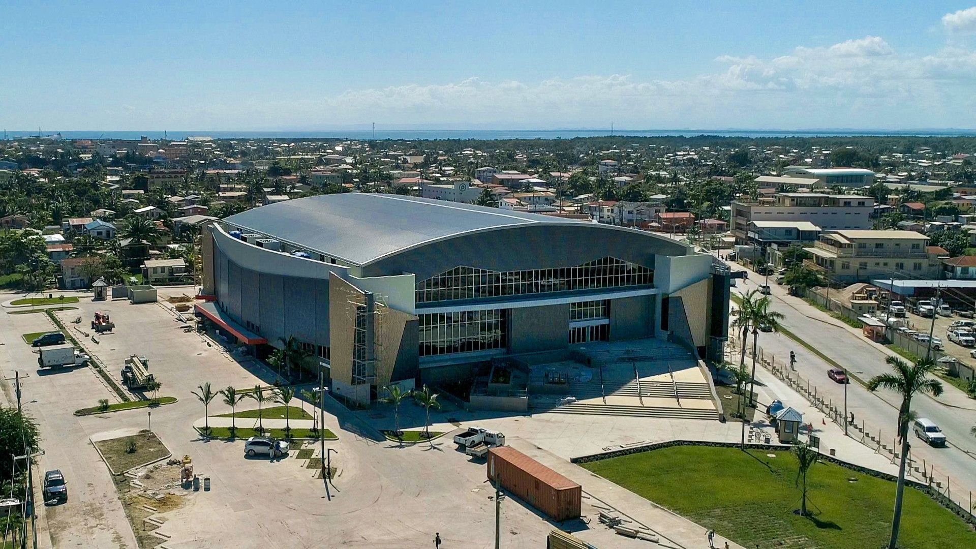 An aerial view of a large building in the middle of a city