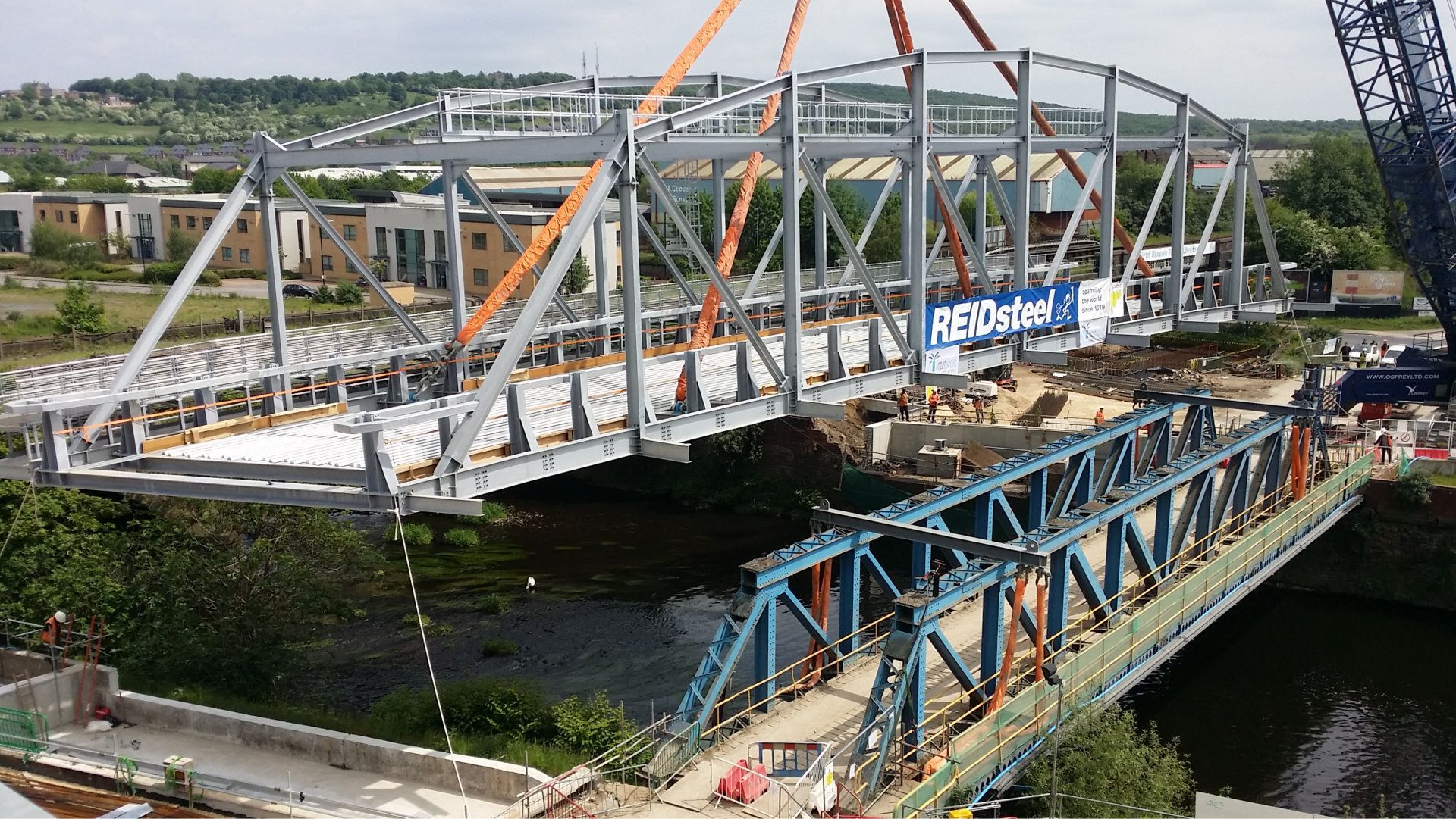A bridge is being built over a body of water