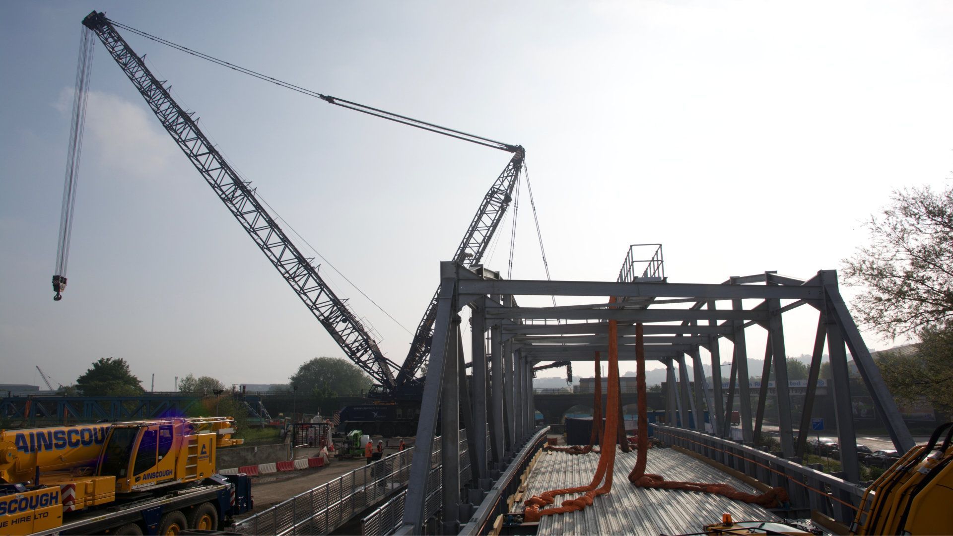 A large crane is being used to build a bridge