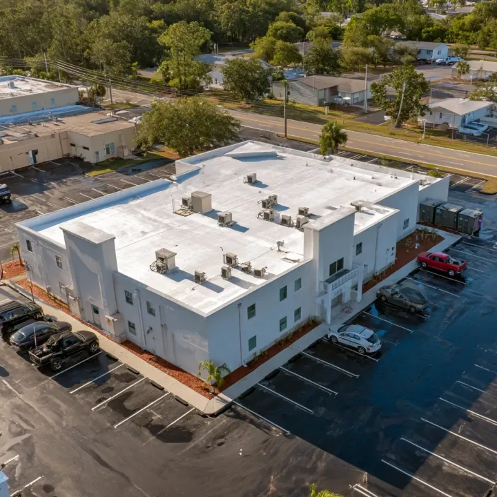 Professional asphalt shingle roofing Lehigh Acres FL, Florida roofers using algae-resistant shingles, UV-reflective granules, and architectural designs.